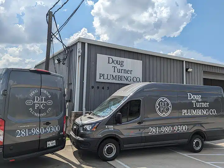 Doug Turner Plumbing CO fleet vans outside of office in Sugar Land, TX.