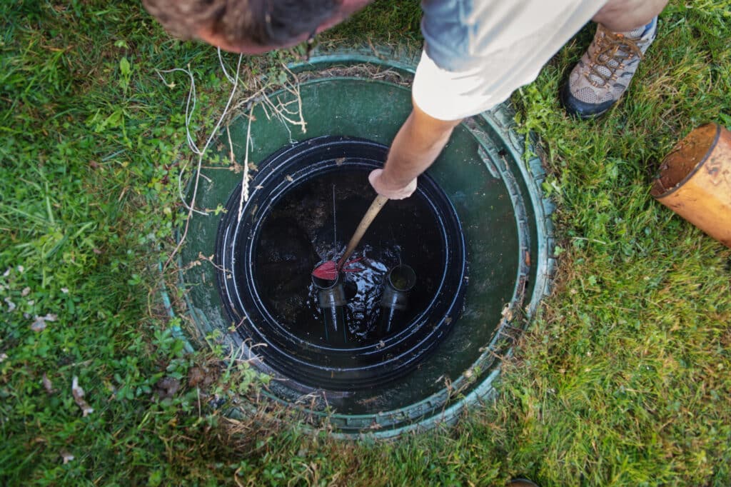 Cleaning and unblocking septic system.